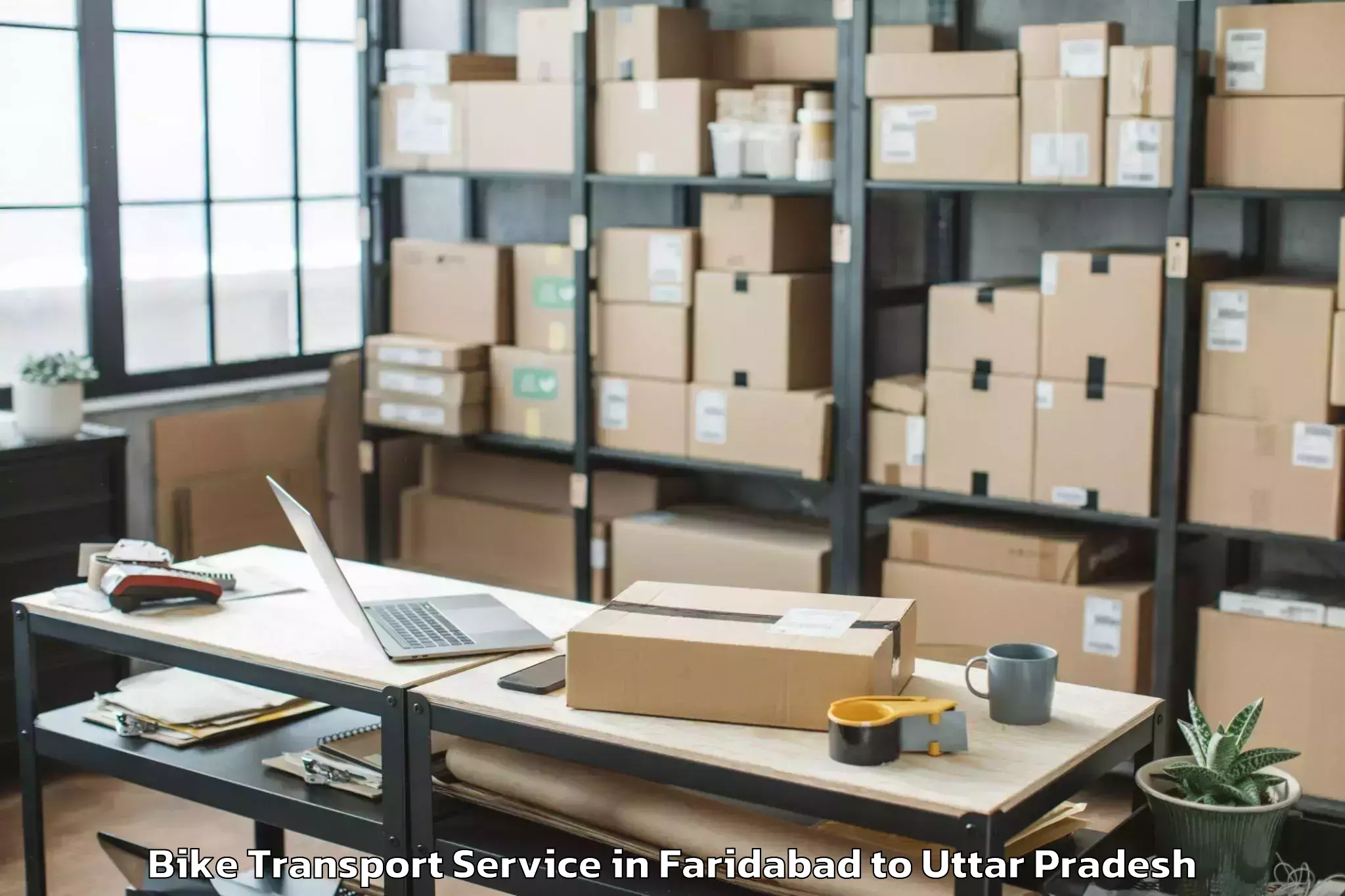 Leading Faridabad to Belthara Road Bike Transport Provider